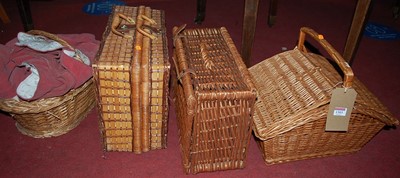 Lot 1303 - Four various wicker baskets, the largest width...