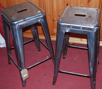 Lot 1365 - A pair of Tolex metal bar stools