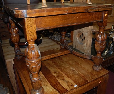 Lot 1339 - A 1930s oak draw leaf dining table, 92 x 92cm