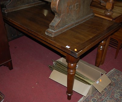 Lot 1345 - A 20th century oak dining table, on turned...
