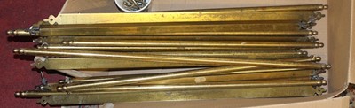 Lot 1342 - A collection of 20th century brass stair rods,...
