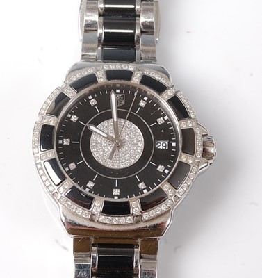 Lot 2316 - A lady's steel and black ceramic Tag Heuer...