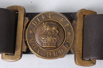 Lot 124 - A British Army black leather belt, the brass...
