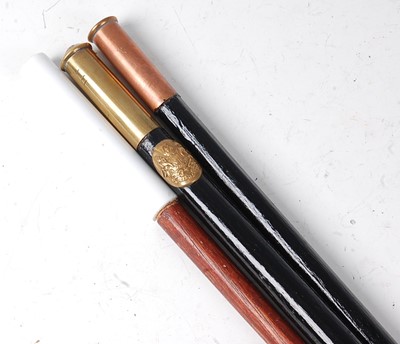 Lot 88 - A military swagger stick, having an ebonised...