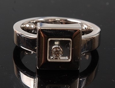 Lot 2214 - An 18ct white gold Happy Diamond ring by...