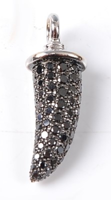 Lot 2272 - A white metal black diamond horn pendant by...