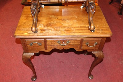 Lot 1421 - A 19th century mahogany three drawer lowboy,...