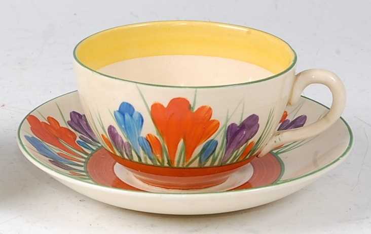 Lot 2 - A Clarice Cliff Crocus pattern pottery teacup...