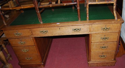 Lot 1327 - A Victorian oak round cornered and green...