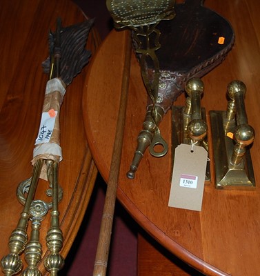 Lot 1310 - A collection of various brass fireside wares,...