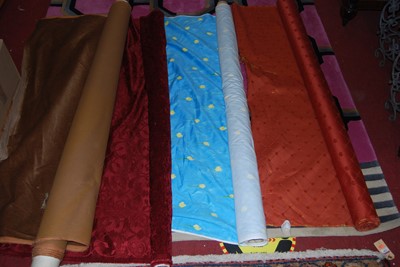 Lot 1146 - A collection of various sundry rolls of fabric