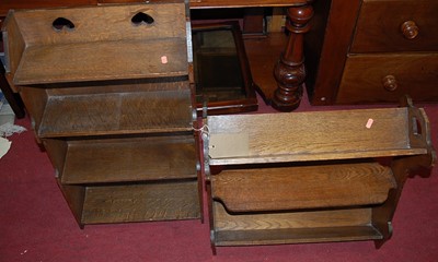 Lot 1236 - An Arts & Crafts small oak freestanding...