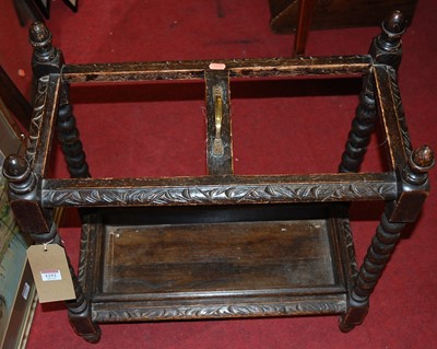 Lot 1252 - An early 20th century relief carved oak bobbin...