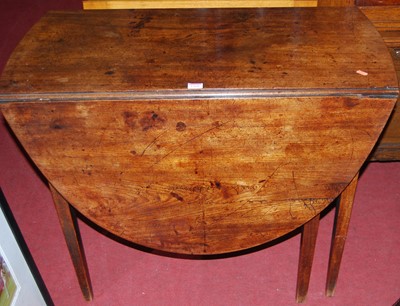 Lot 1260 - A 19th century mahogany drop leaf dining table