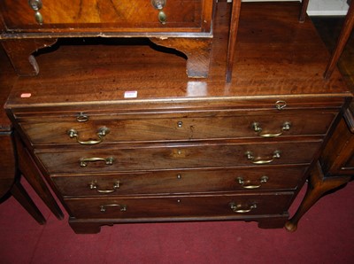 Lot 1262 - An early 19th century mahogany chest of four...