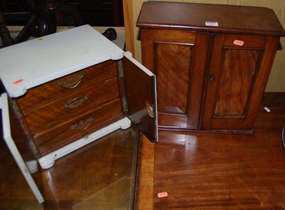 Lot 1264 - A small Victorian mahogany double door table...