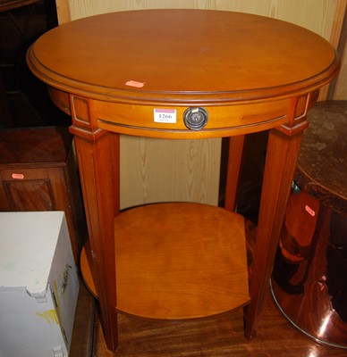 Lot 1266 - A contemporary cherrywood oval two-tier...