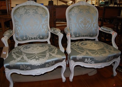 Lot 1314 - A pair of Louis XV style white painted and...