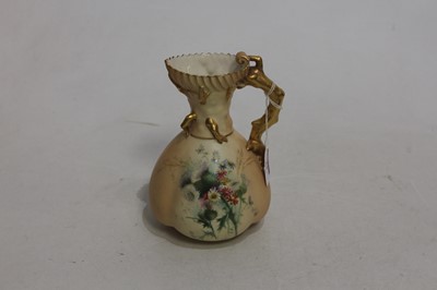 Lot 23 - A circa 1900 Royal Worcester blush ivory jug,...
