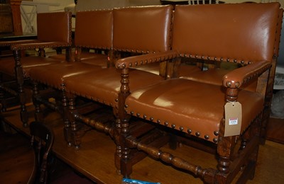 Lot 1329 - A set of eight joined oak Cromwellian style...