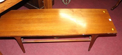 Lot 1341 - A 1970s teak long low coffee table with...
