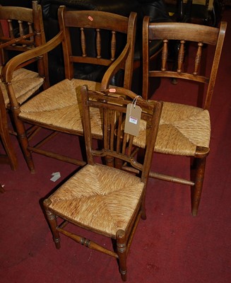 Lot 1385 - A set of four early 20th century beech spindle...