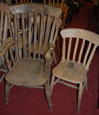 Lot 1393 - A set of seven faded beech slat back kitchen...