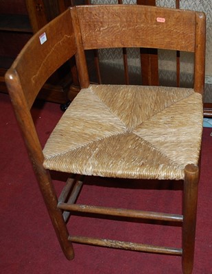Lot 1395 - A 1930s oak framed tan leather and further...