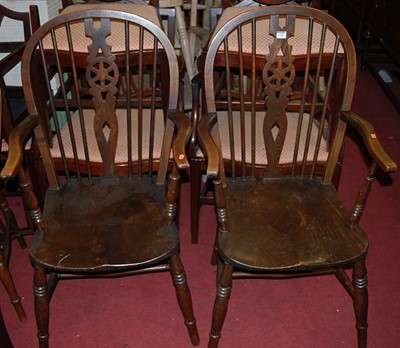 Lot 1398 - A set of five elm and beech wheelback kitchen...