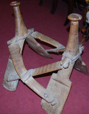 Lot 1403 - A tribal hardwood camel saddle