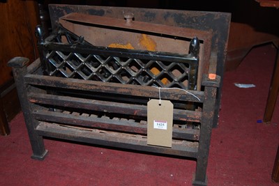 Lot 1425 - A cast iron fire basket, together with an...