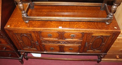 Lot 1410 - An early 20th century geometric oak sideboard,...