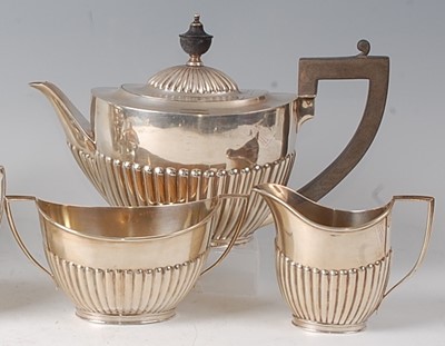 Lot 2116 - A George V silver three-piece tea set,...