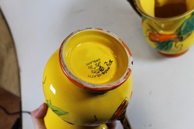 Lot 172 - A pair of Art Deco Wade Heath yellow glazed...