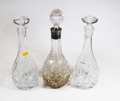 Lot 160 - A pressed glass decanter with a metal collar...