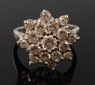 Lot 2226 - A white metal diamond circular cluster...