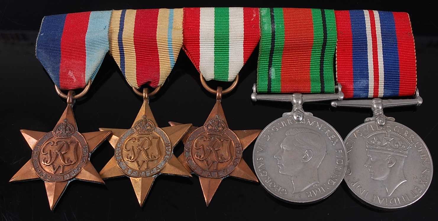 Lot 7 - A WW II group of five medals to include...