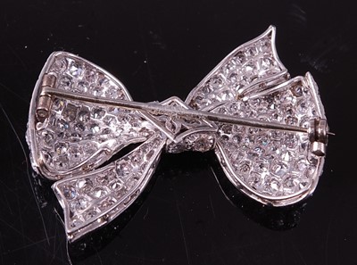 Lot 2233 - An early 20th century white metal diamond bow...