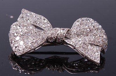Lot 2233 - An early 20th century white metal diamond bow...
