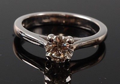 Lot 2239 - An 18ct white gold diamond solitaire ring,...