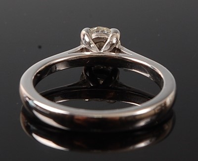 Lot 2239 - An 18ct white gold diamond solitaire ring,...