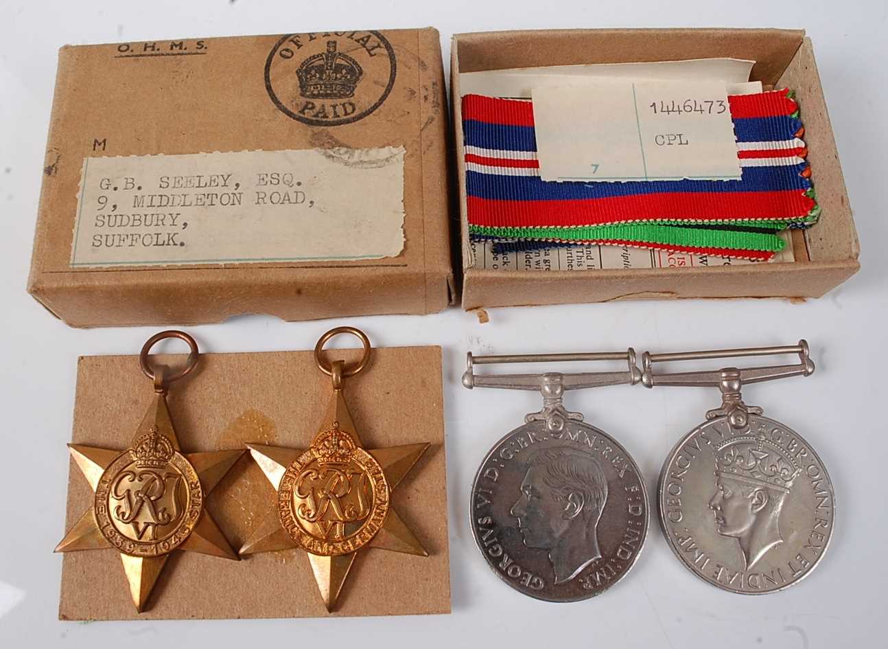 Lot 29 - A group of four WW II medals to include...