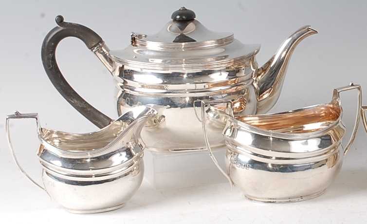 Lot 2115 - A silver three-piece tea set, in the early...