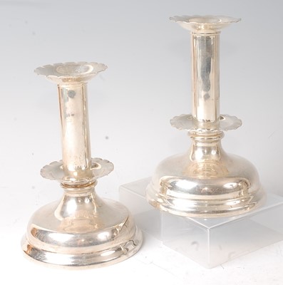 Lot 2119 - A pair of Edwardian silver candlesticks, in...