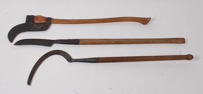 Lot 389 - * An early model bush brush axe, the blade...