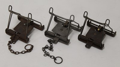 Lot 428 - * A Sawyer vermin trap with chain; together...