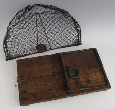 Lot 435 - * An early 20th century pine and iron magpie...