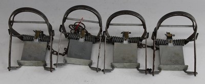 Lot 448 - * A collection of four Fenn Mk I rabbit traps,...