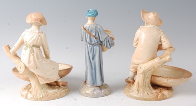 Lot 2041 - A pair of Royal Worcester figural comports by...