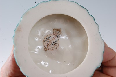 Lot 2042 - A Royal Worcester Nautilus shell, heightened...